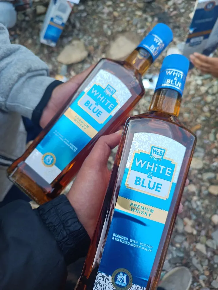 White and Blue Whisky Price in Up